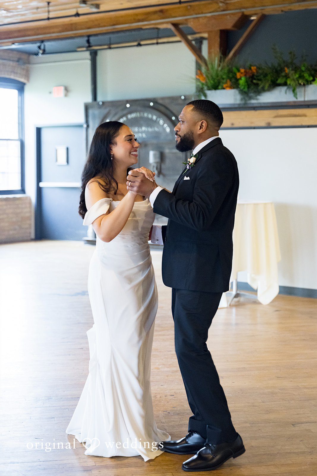 Kiarra + Anthony Joyful bridal celebration moment with someone at Solar Arts