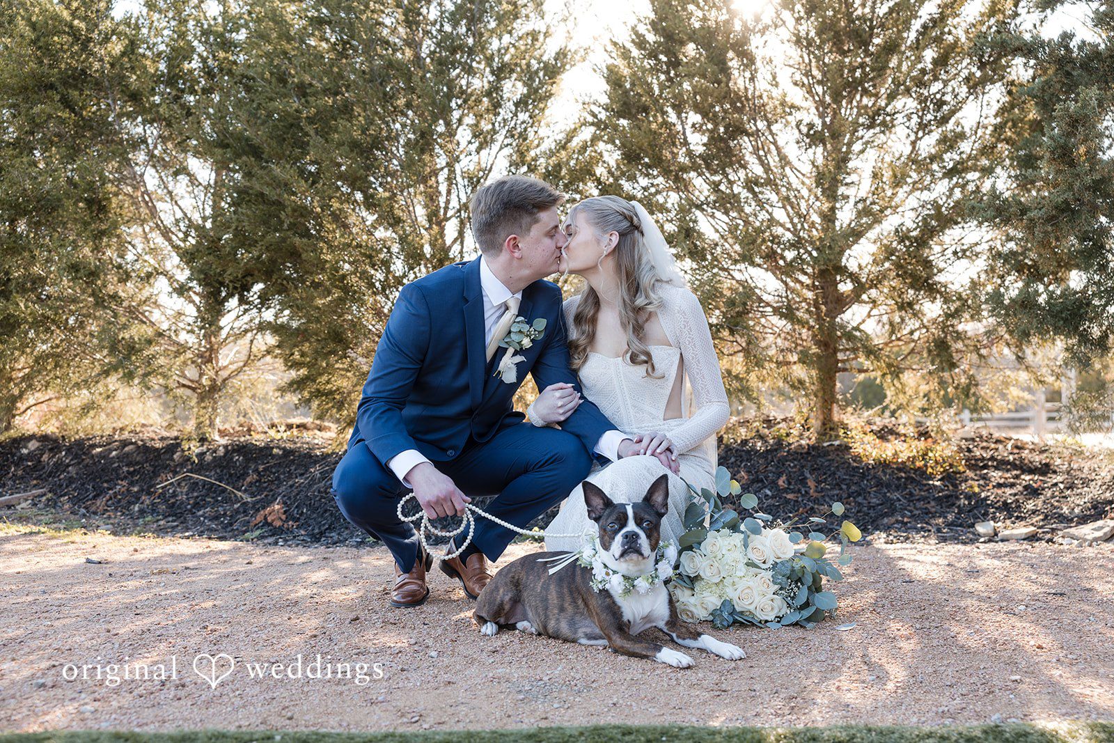 Jacobi + Marlie Romantic bride and groom kiss moment at Stone Crest
