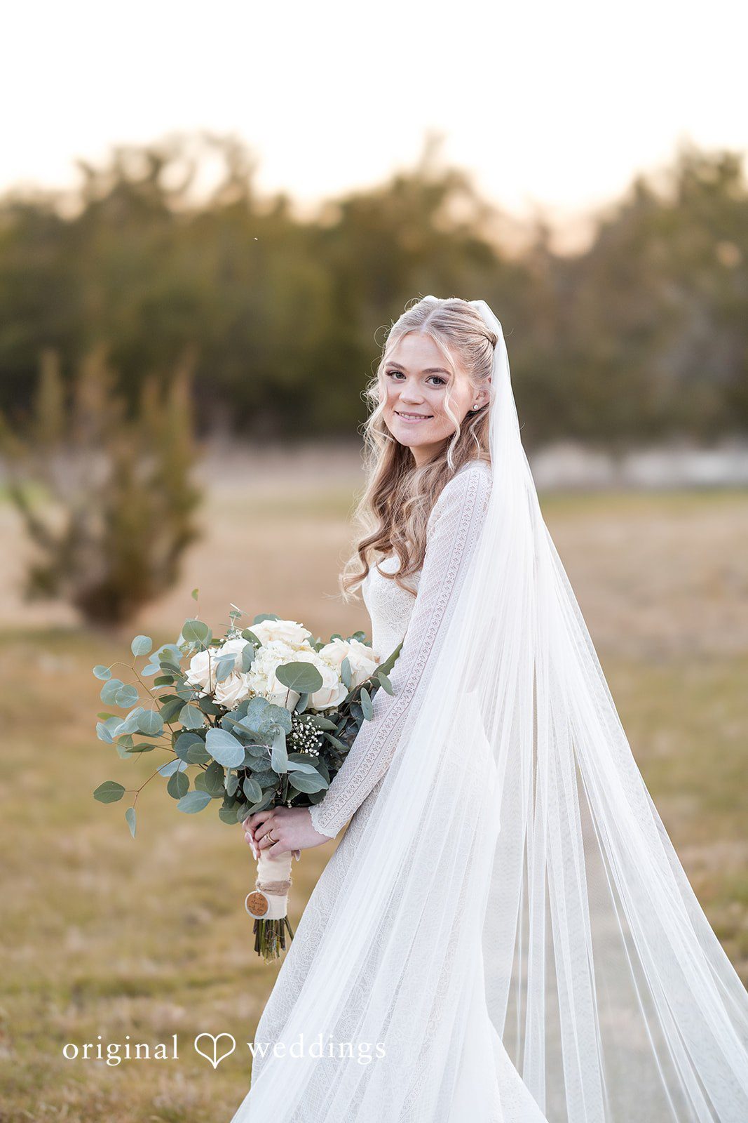 Jacobi + Marlie Elegant bridal portrait with flowers bouquet at Stone Crest