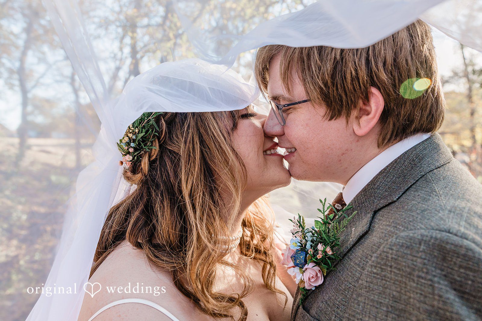 November 15, 2025 – Brittney & Benjamin- (ID-3986) Close-up of a bride and groom sharing a kiss under a veil.