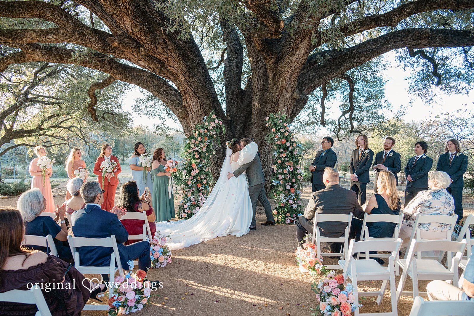 November 15, 2025 – Brittney & Benjamin- (ID-3986) Bride and groom sharing first kiss after wedding ceremony at Stonebridge Wedding & Event Venue.