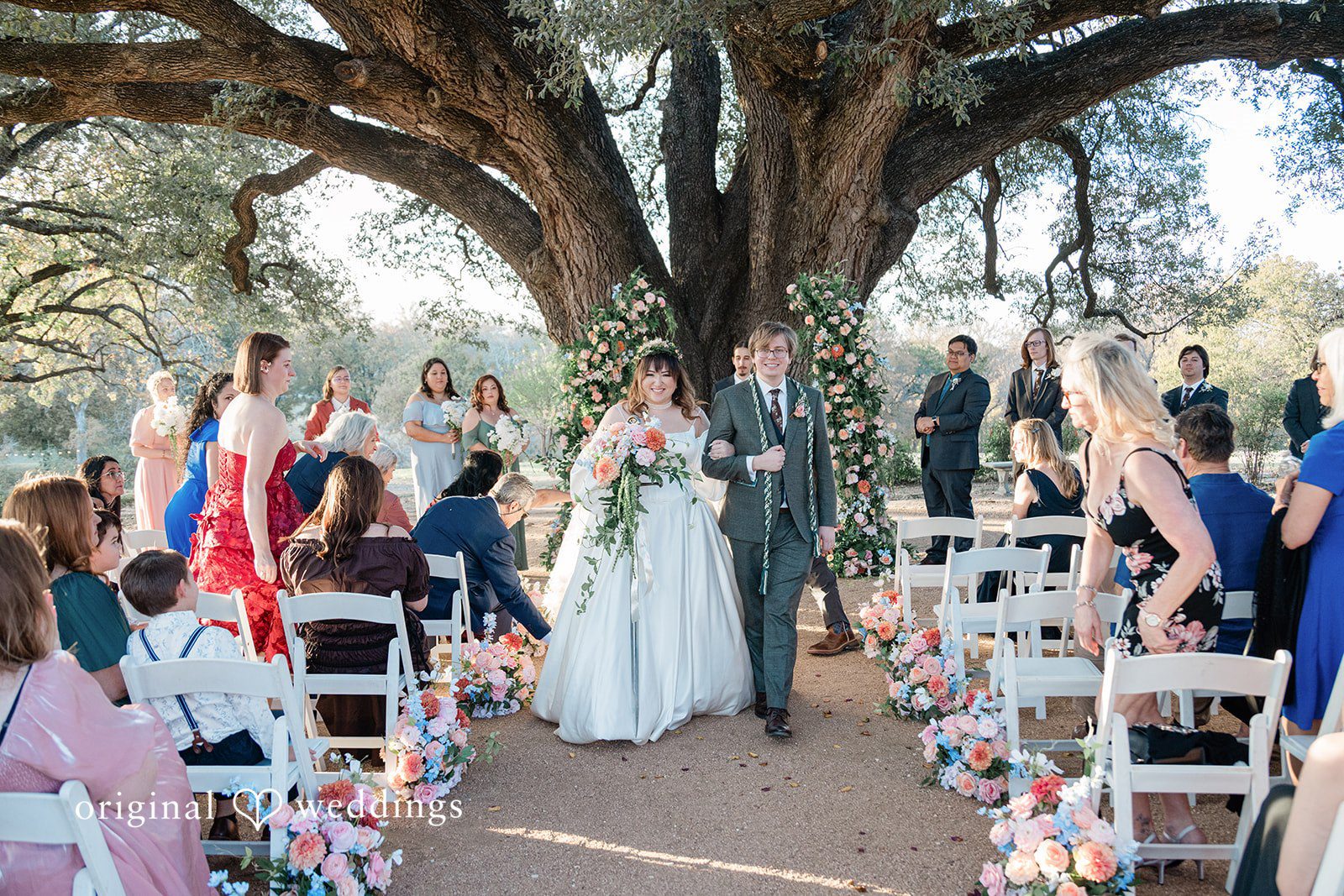 November 15, 2025 – Brittney & Benjamin- (ID-3986) A bride walking down the aisle during a wedding ceremony.