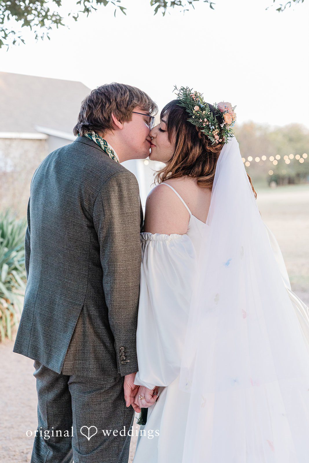 November 15, 2025 – Brittney & Benjamin- (ID-3986) A bride and groom sharing a kiss at Stonebridge Wedding & Event Venue.
