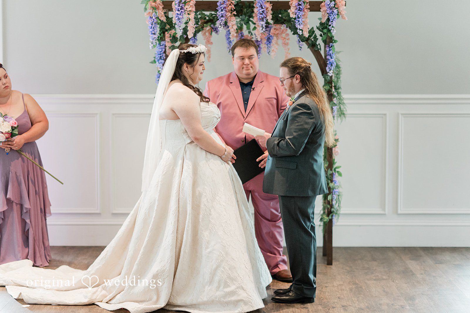 Groom reading his vows to bride during wedding ceremony at Sugar Valley Golf Club