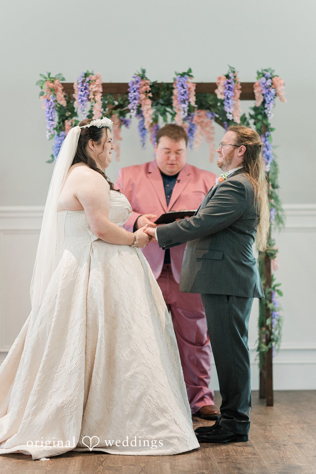Beautiful picture of couple during ceremony at Sugar Valley Golf Club captured by Cincinnati wedding photographers from Original Weddings