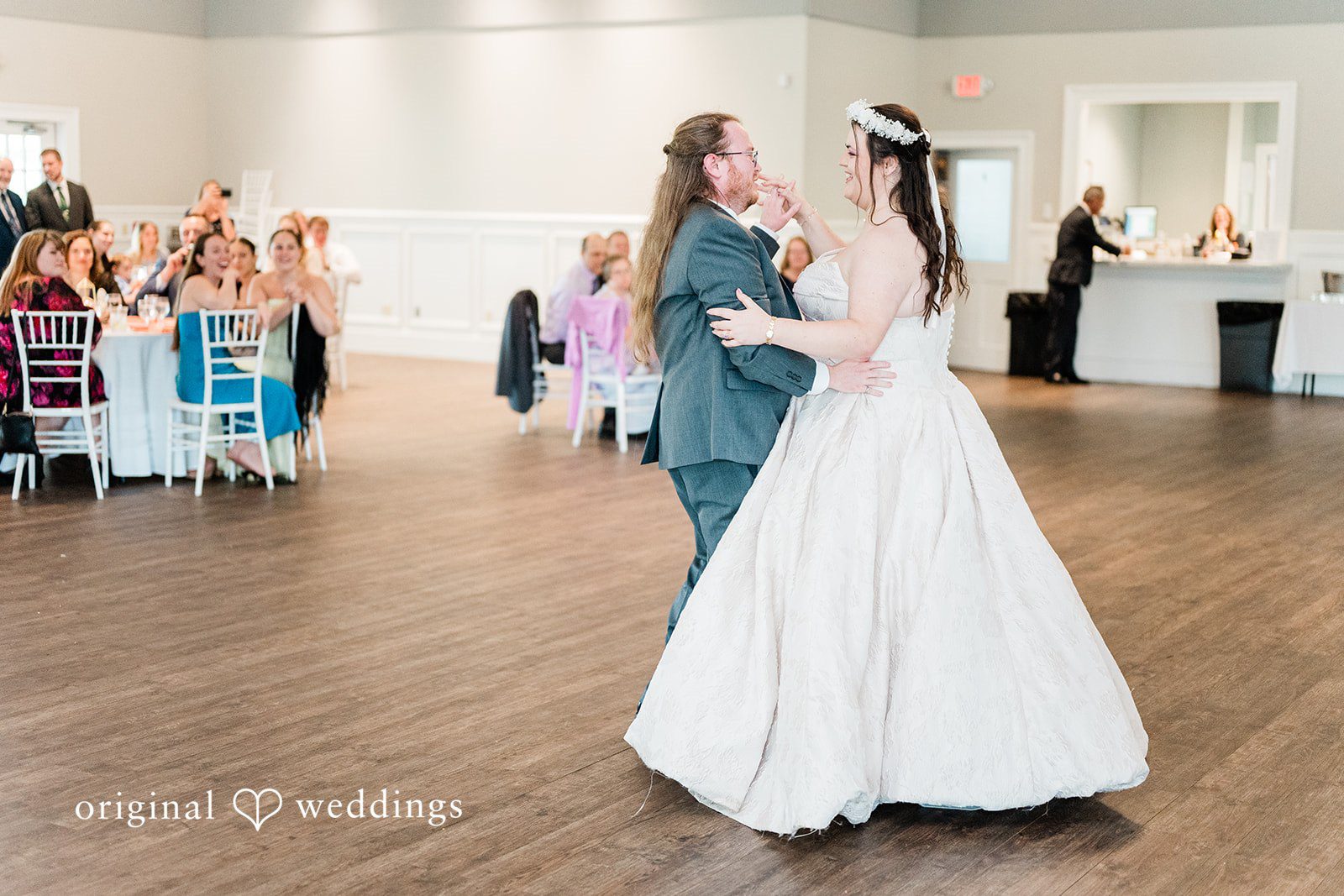 Bride and groom sharing a romantic dance