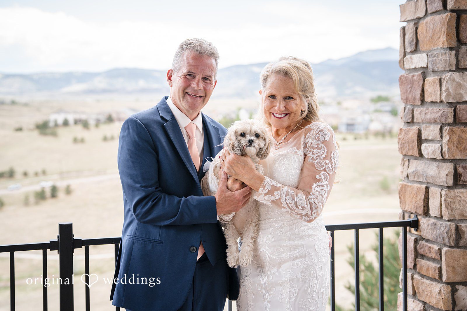 Jacquelyn + Millard Bride and groom posing with their dog for a sweet portrait at Sunrise Amphitheater.