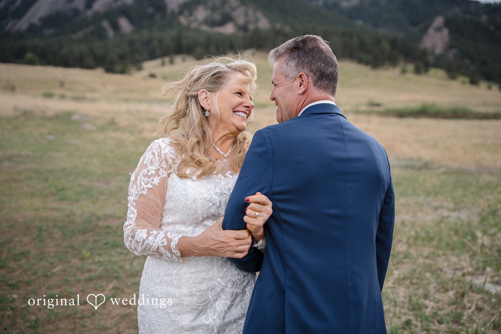Jacquelyn + Millard Bride and groom sharing a joyful moment during portraits