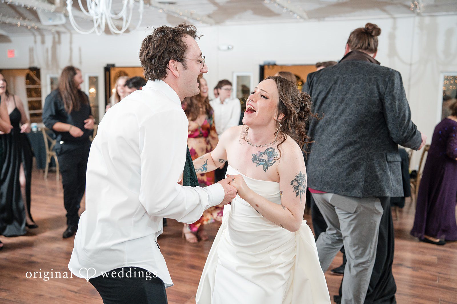 Hannah + Kyle Couple show casing their joy at the dance floor during reception
