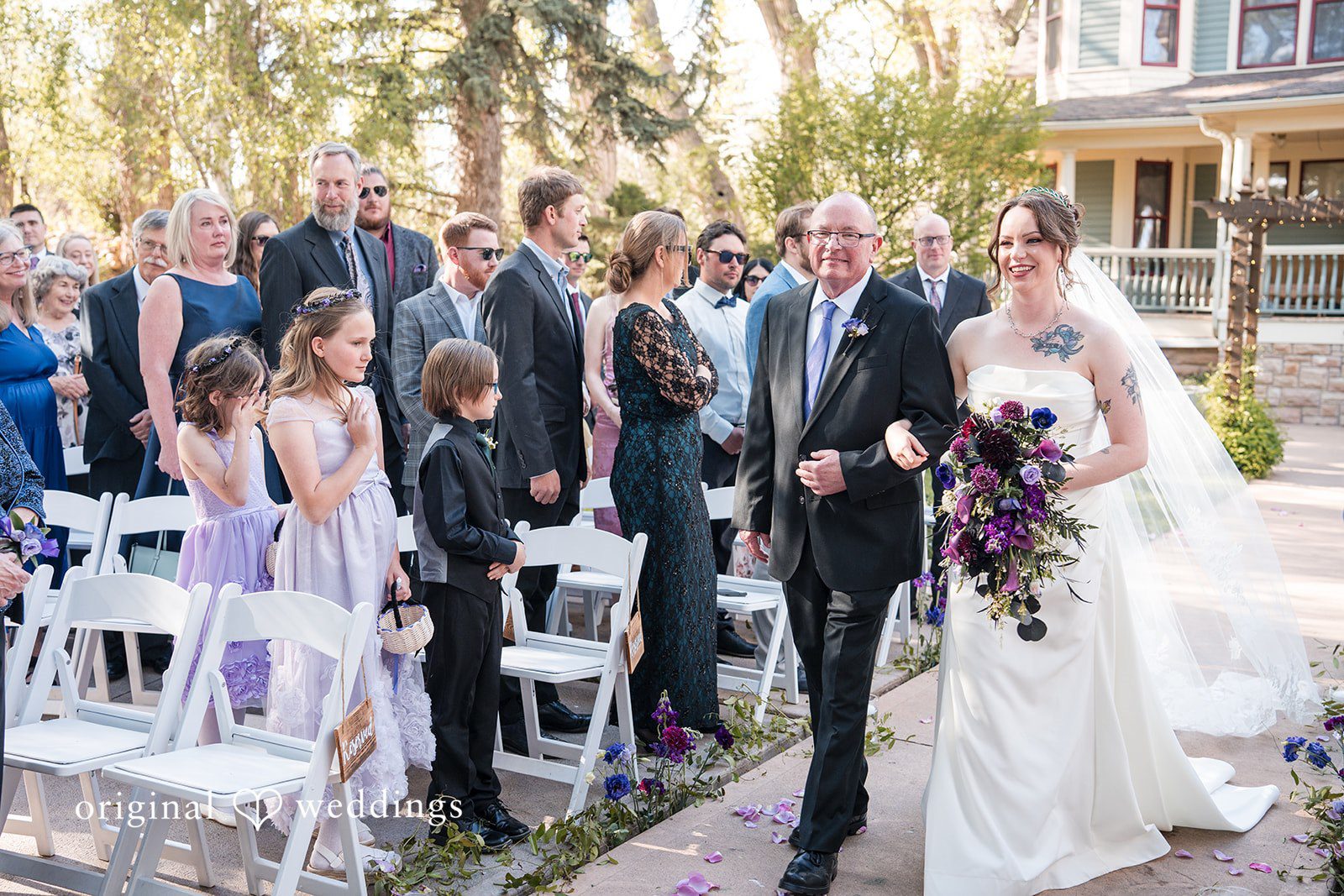 Hannah + Kyle Lovely bride walking down the aisle, walking arms in arms