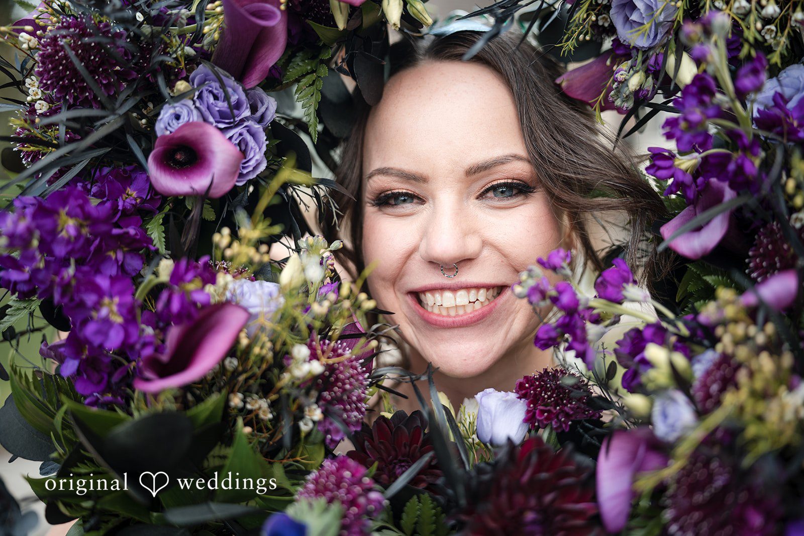 Hannah + Kyle Lovely pose of bride, flowers all around the face.