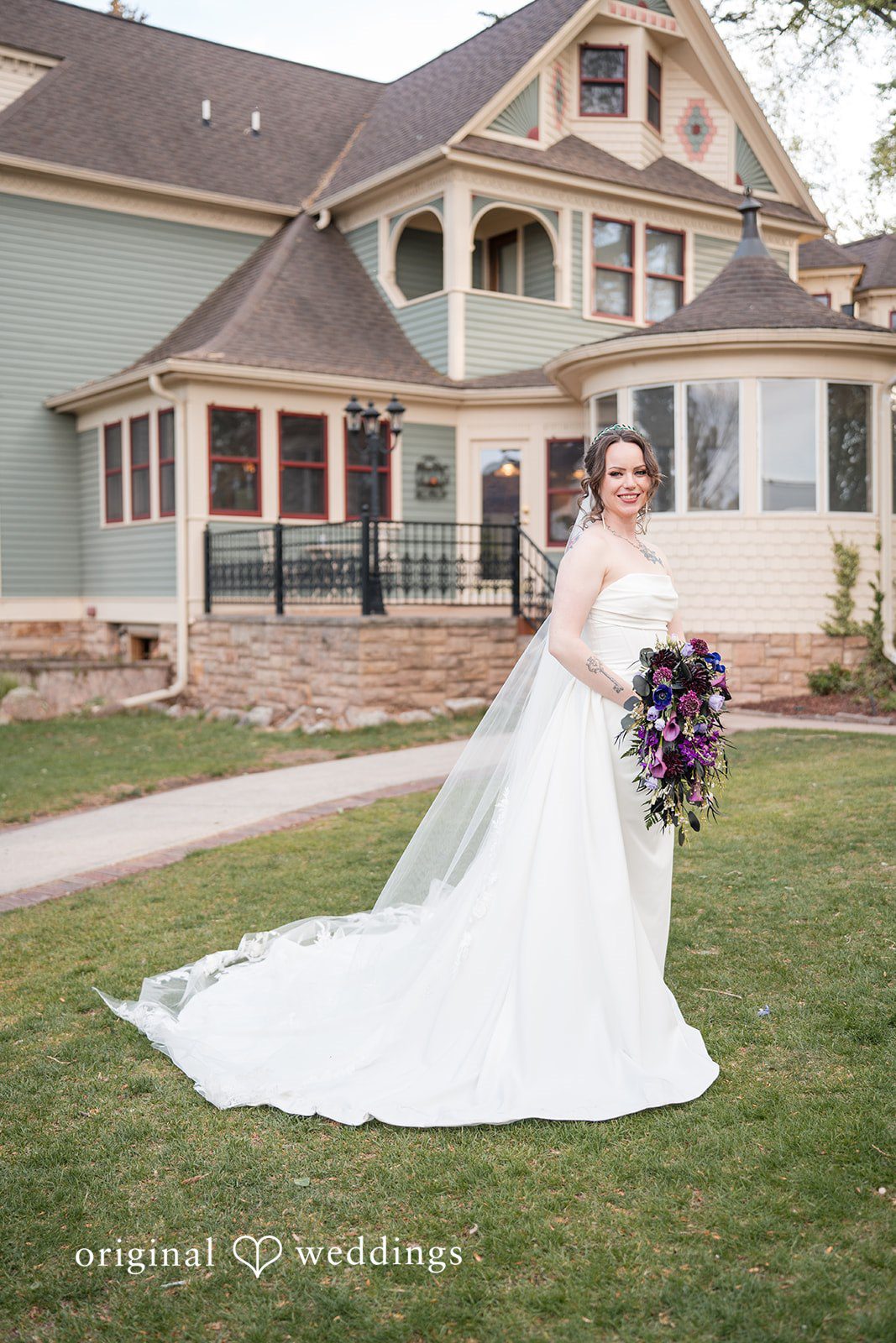 Hannah + Kyle Stunning portrait of bride holding the bouquet at Tapestry House