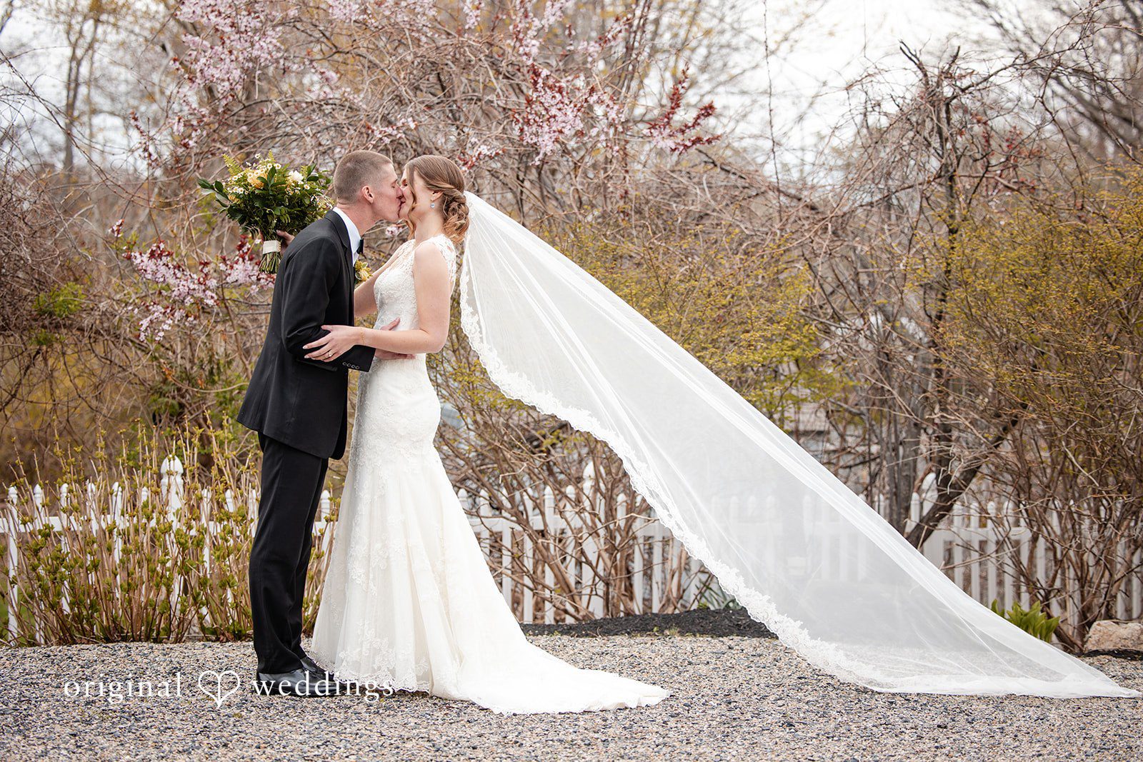 Alanna + Stan Romantic kiss at The Barker House by Wedgewood Weddings