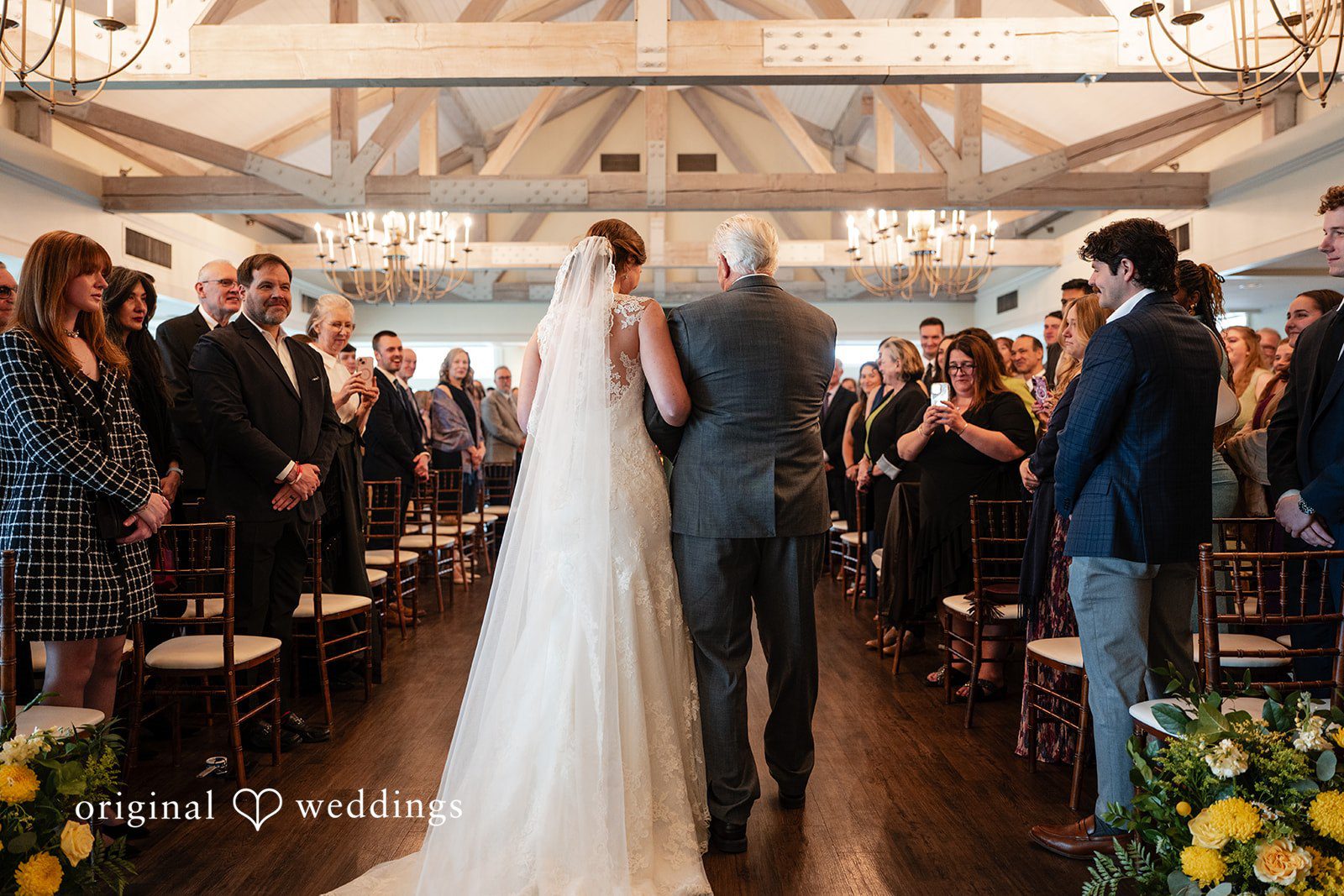 Alanna + Stan Heartfelt wedding entrance surrounded by family and guests