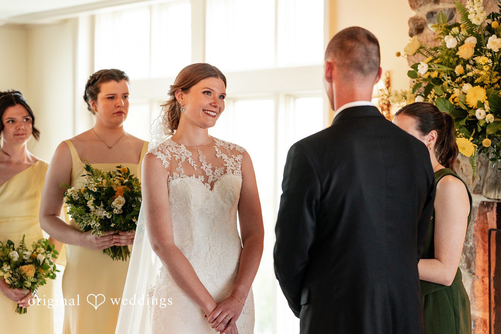 Alanna + Stan Bride smiling lovingly during wedding ceremony