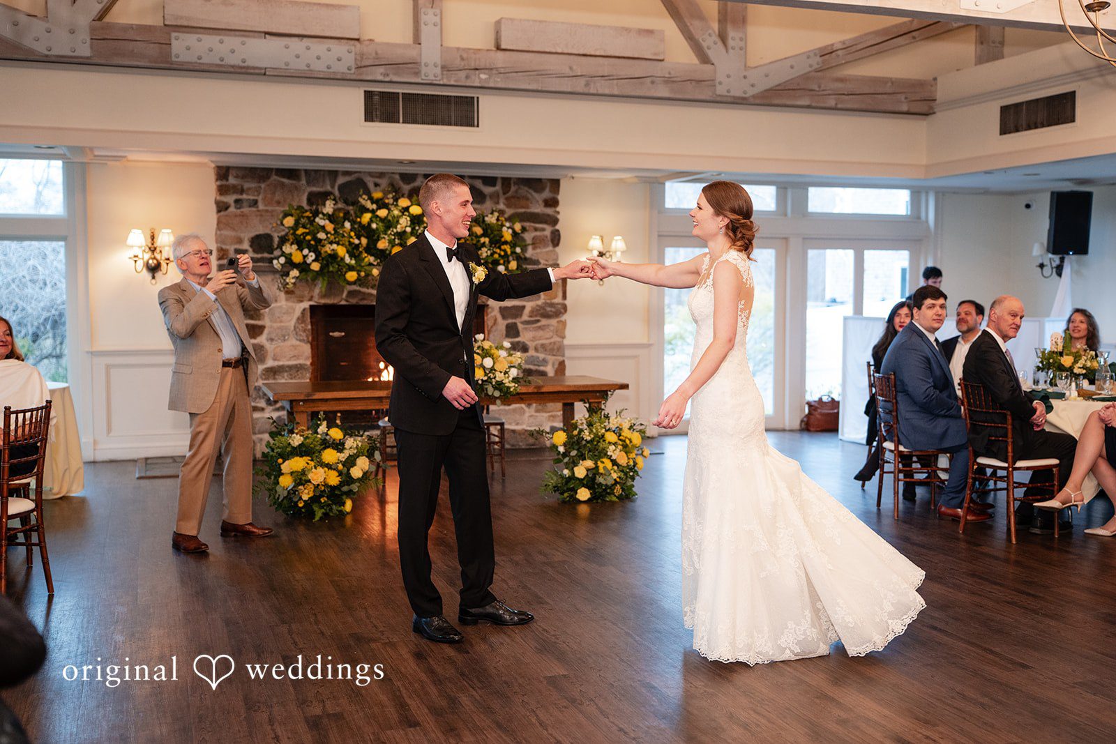 Alanna + Stan Groom twirls bride during their romantic first dance at reception.