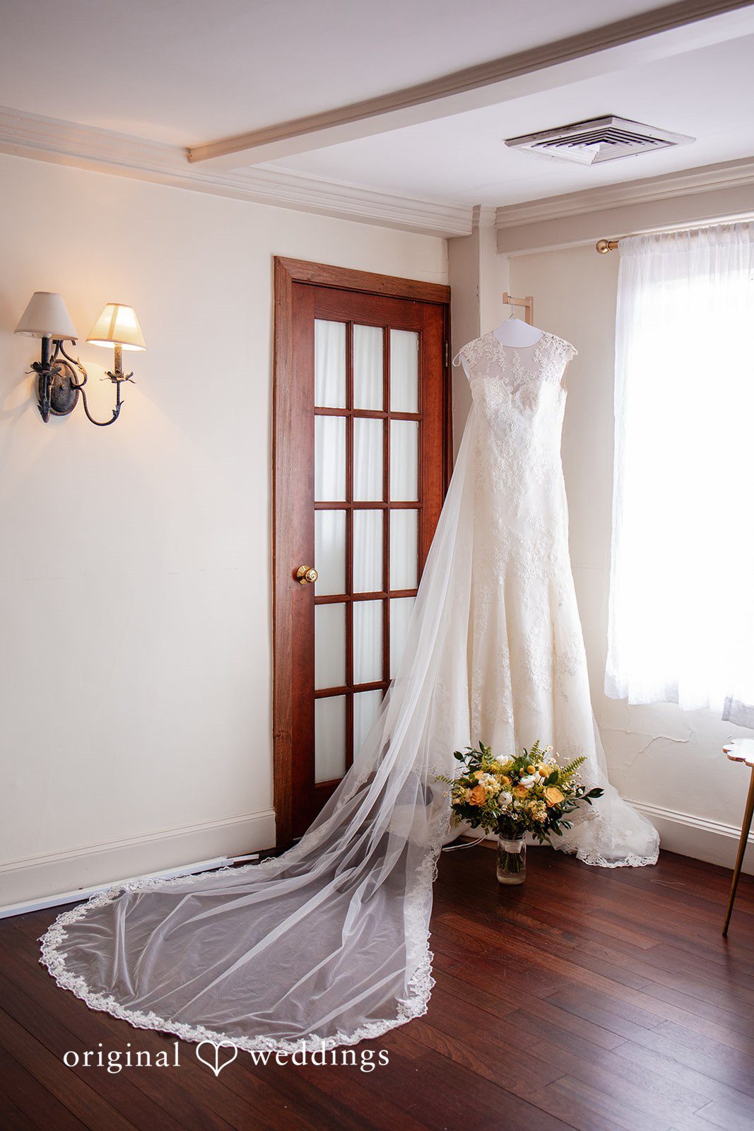Alanna + Stan Beautiful wedding dress with long veil at The Barker House by Wedgewood Weddings