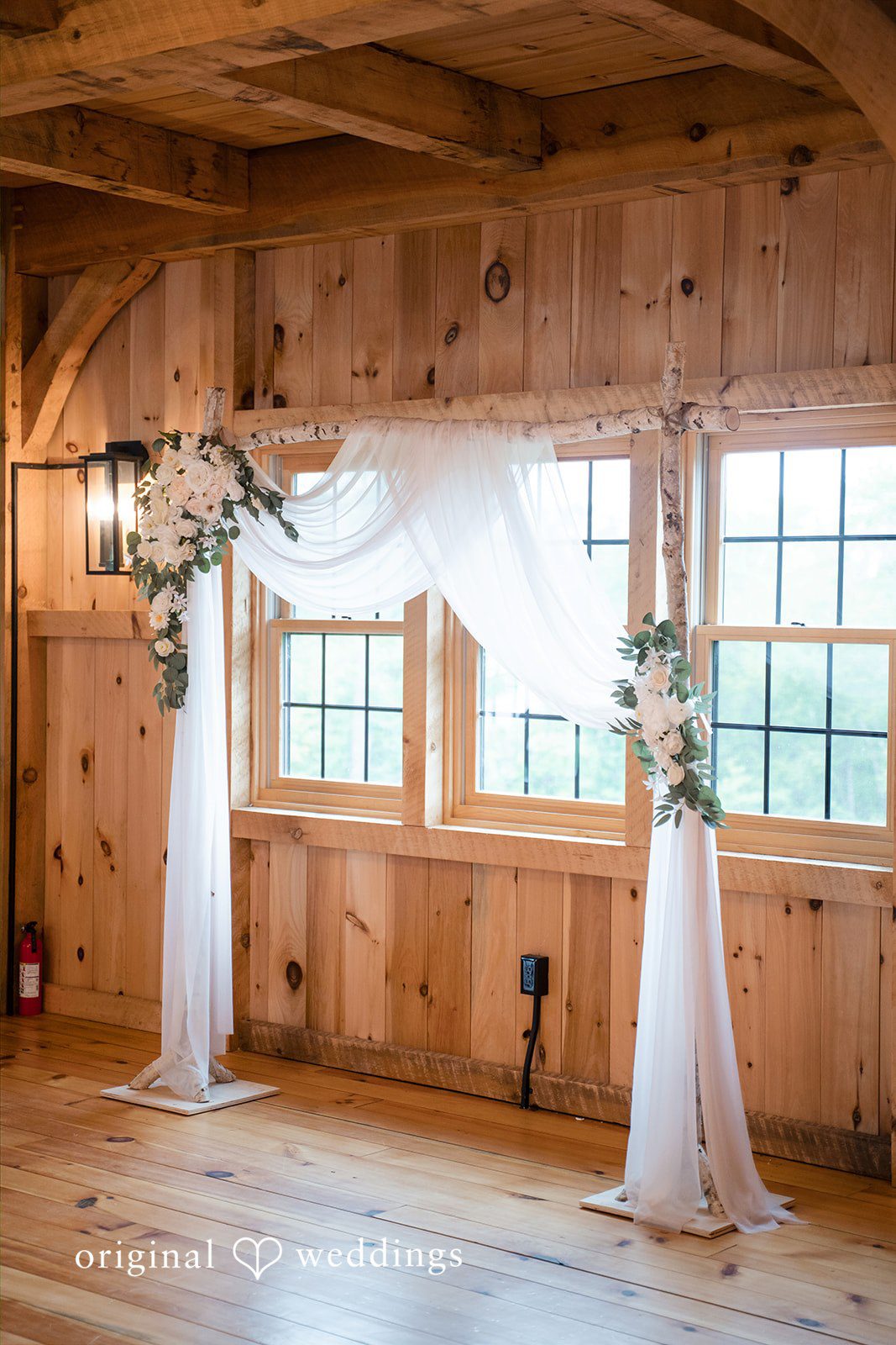 Nicole + Dalton Beautiful wedding ceremony backdrop at The Barn on Harmony Hill