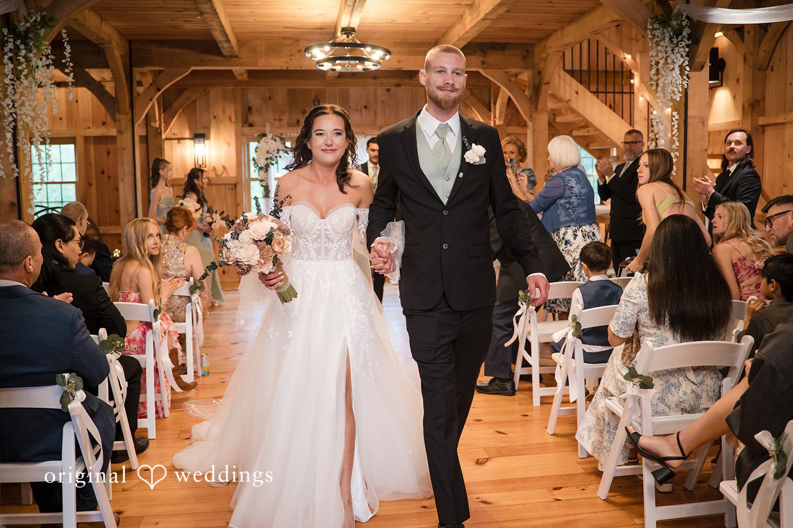 Nicole + Dalton Beautiful couple leaving the altar hands in hands