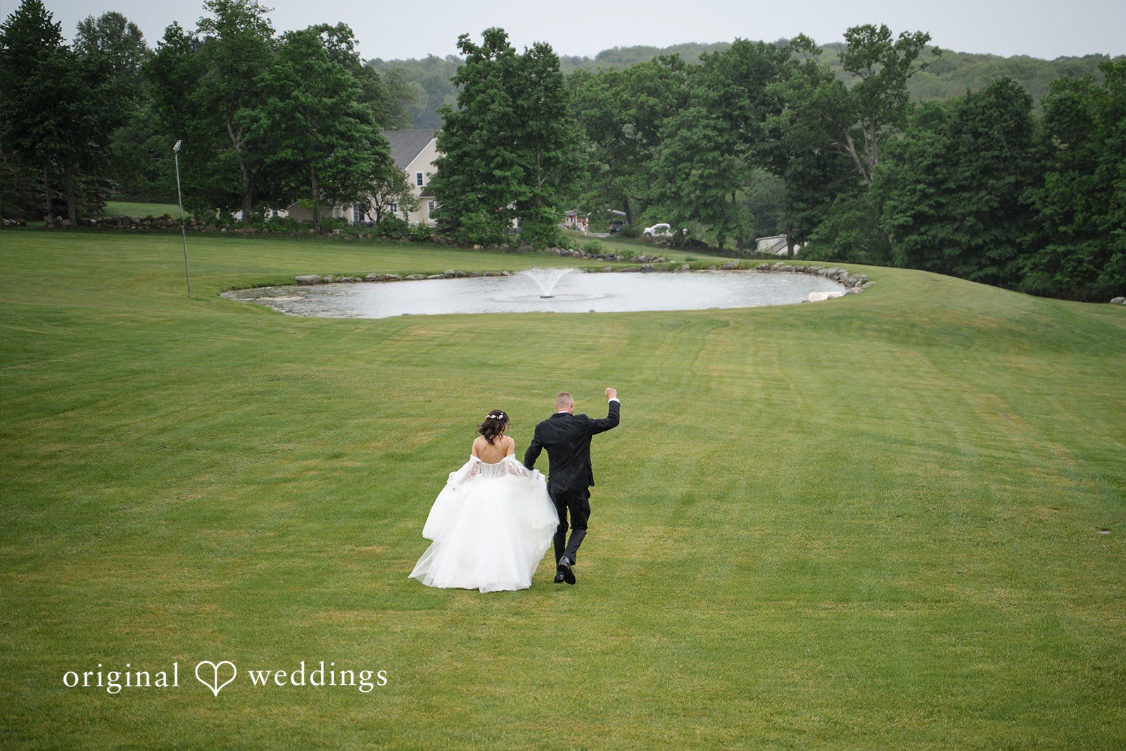 Nicole + Dalton Lovely picture of couple captured from backside with wonderful backdrop