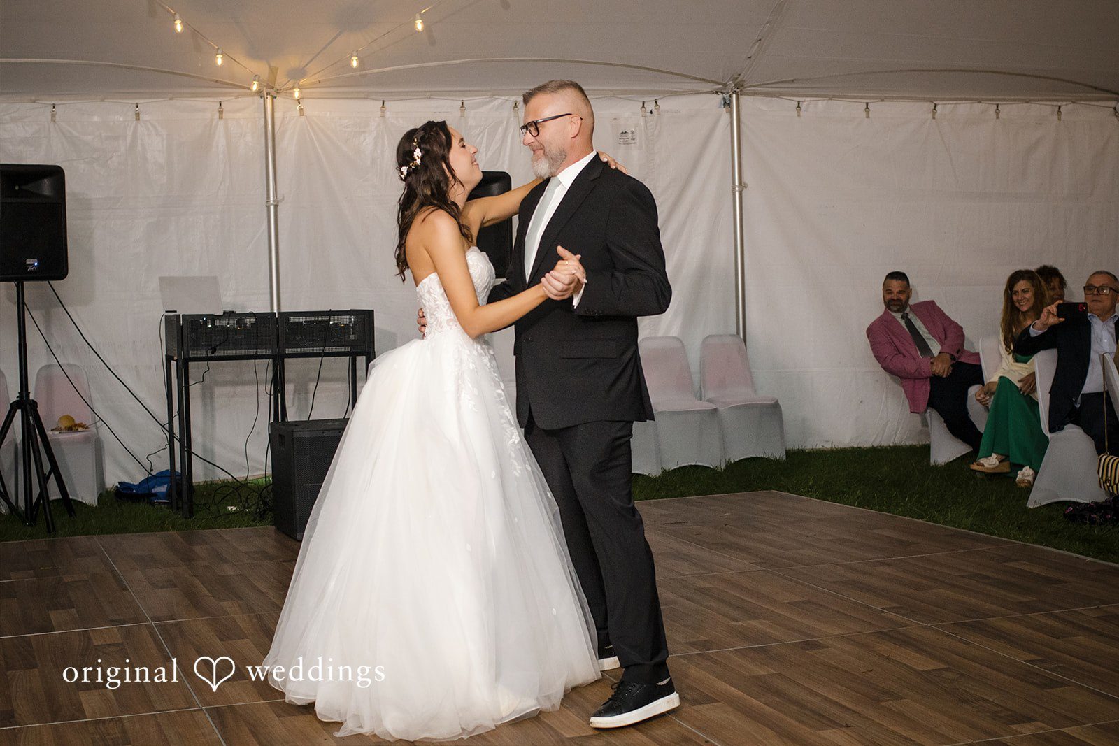 Nicole + Dalton Bride sharing a dance with someone
