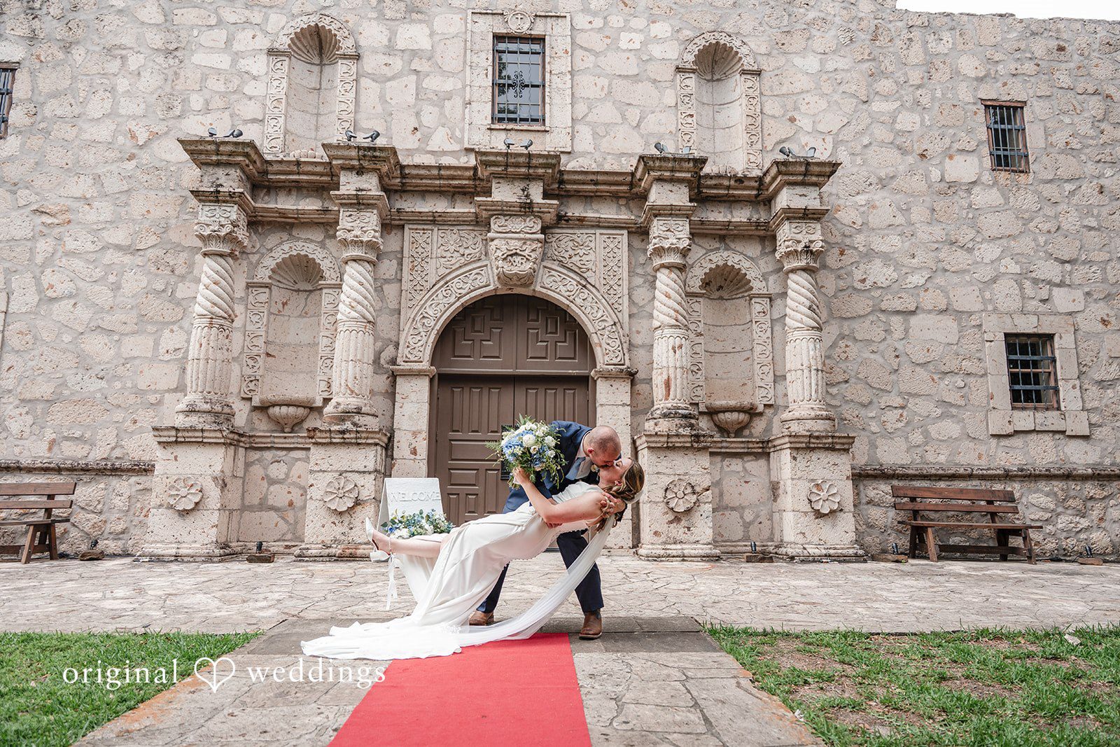 Mary Rose + Nate Romantic portrait of the couple in front of The Cypress Alamo
