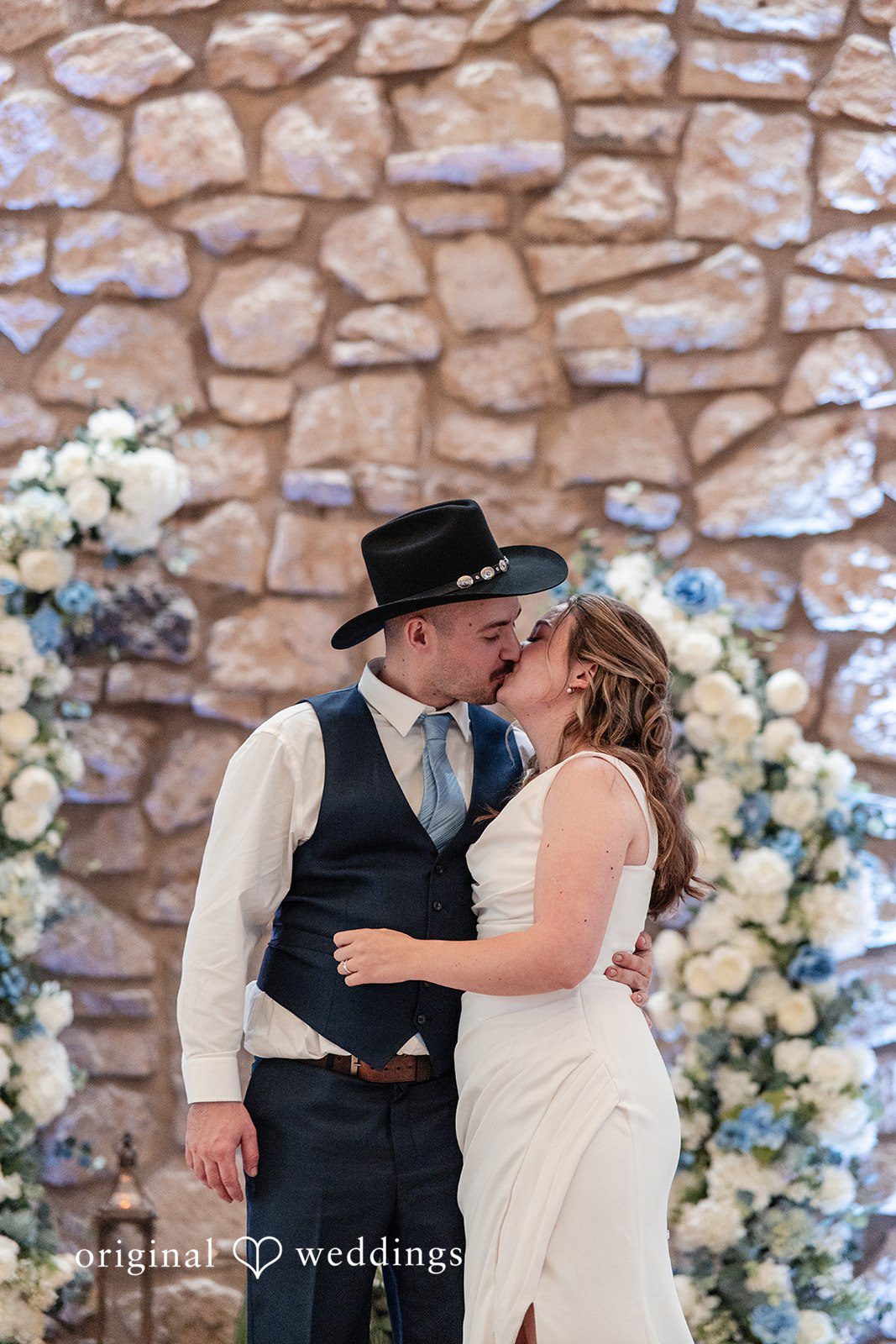 Mary Rose + Nate Bride and groom sharing a kiss during the reception celebration