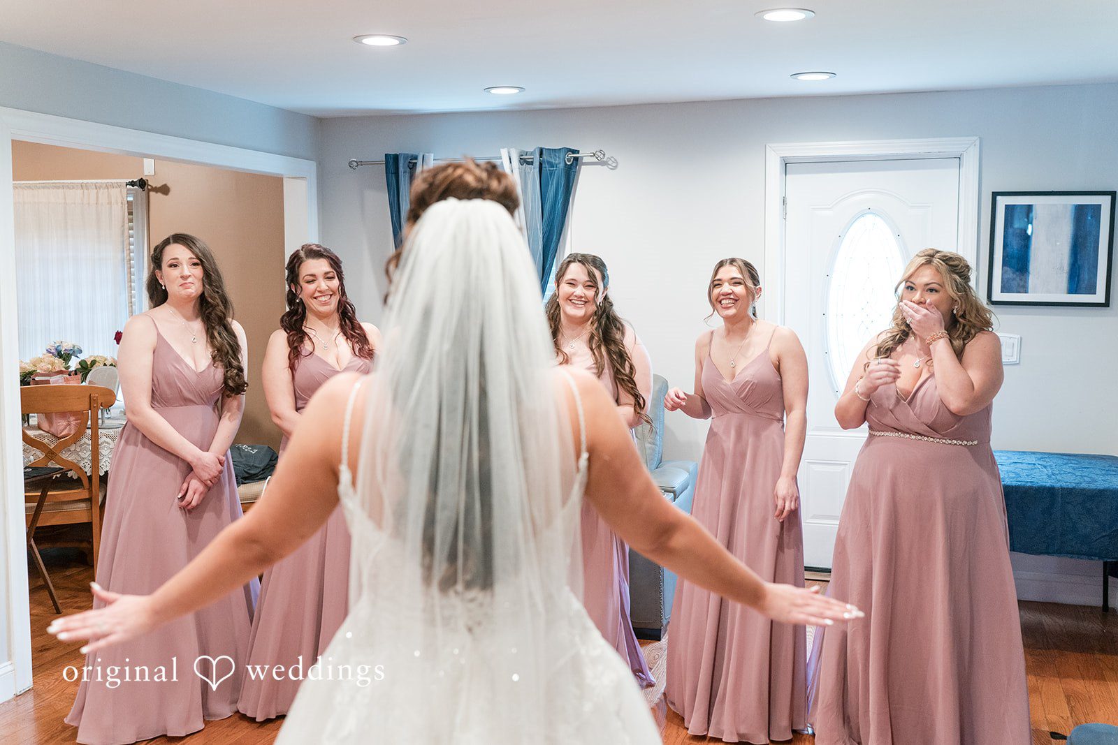 Kimberly + Jeff The bridesmaids are in awe of the bride