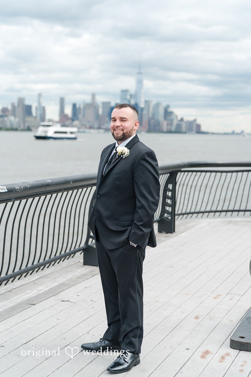 Kimberly + Jeff A stunning portrait of the groom along the waterfront