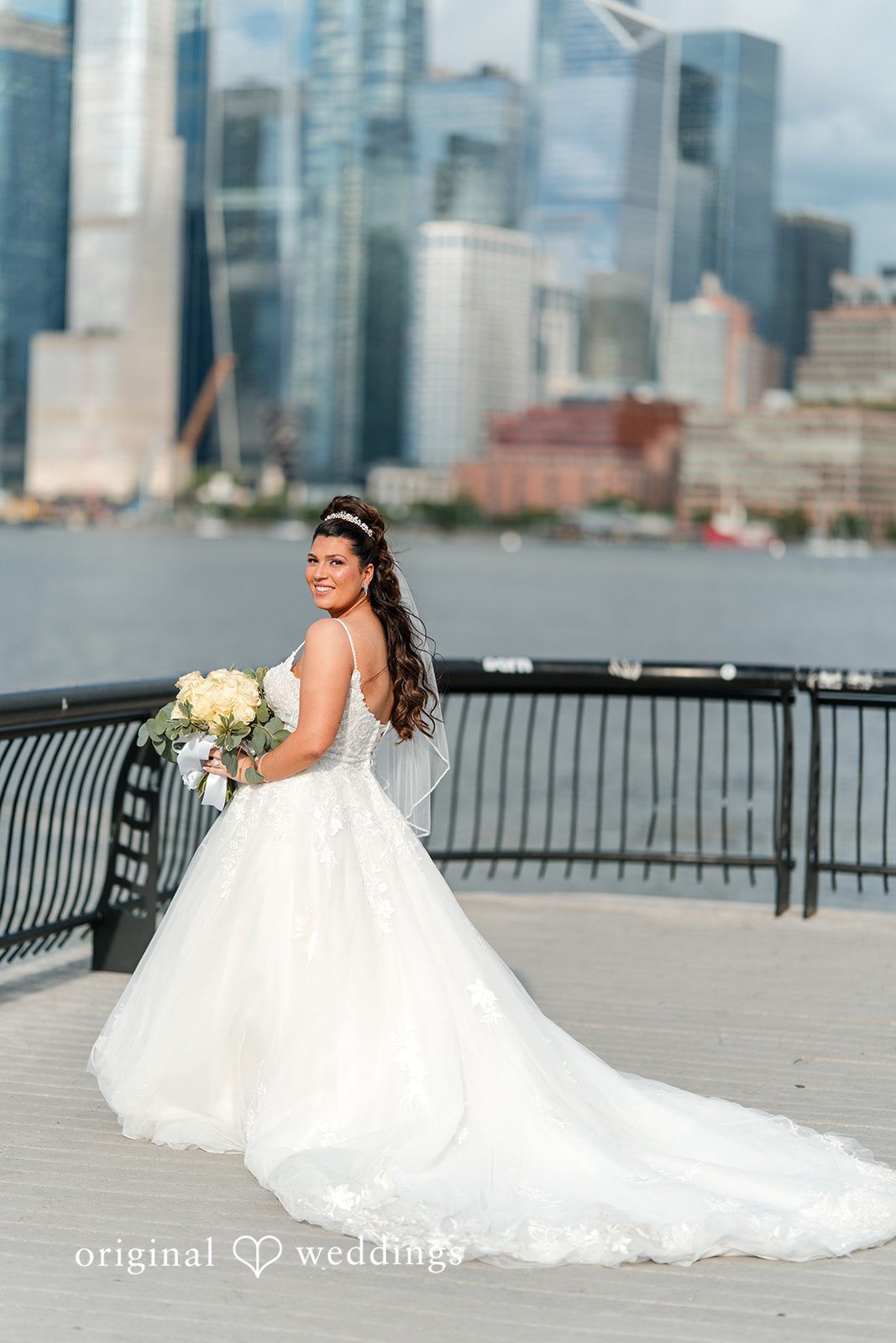 Kimberly + Jeff A stunning portrait of the bride by the waterfront