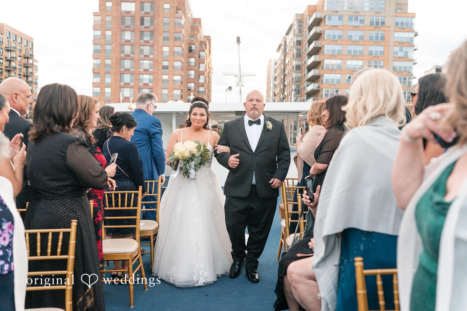 Kimberly + Jeff Our New York City wedding photographers captured the moment the bride's father escorted the bride down the aisle