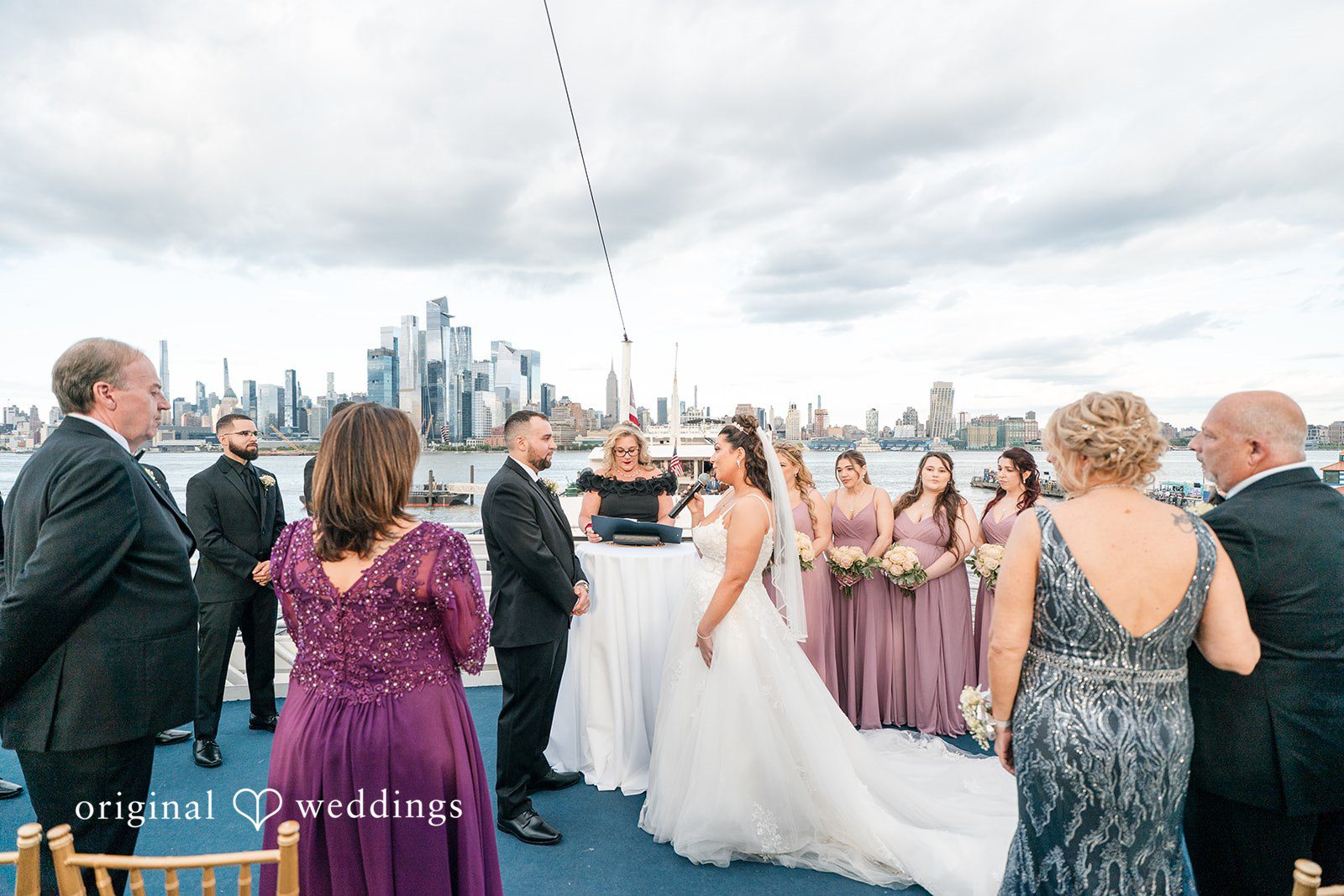Kimberly + Jeff The bride and groom exchange marital vows at The Destiny Yacht