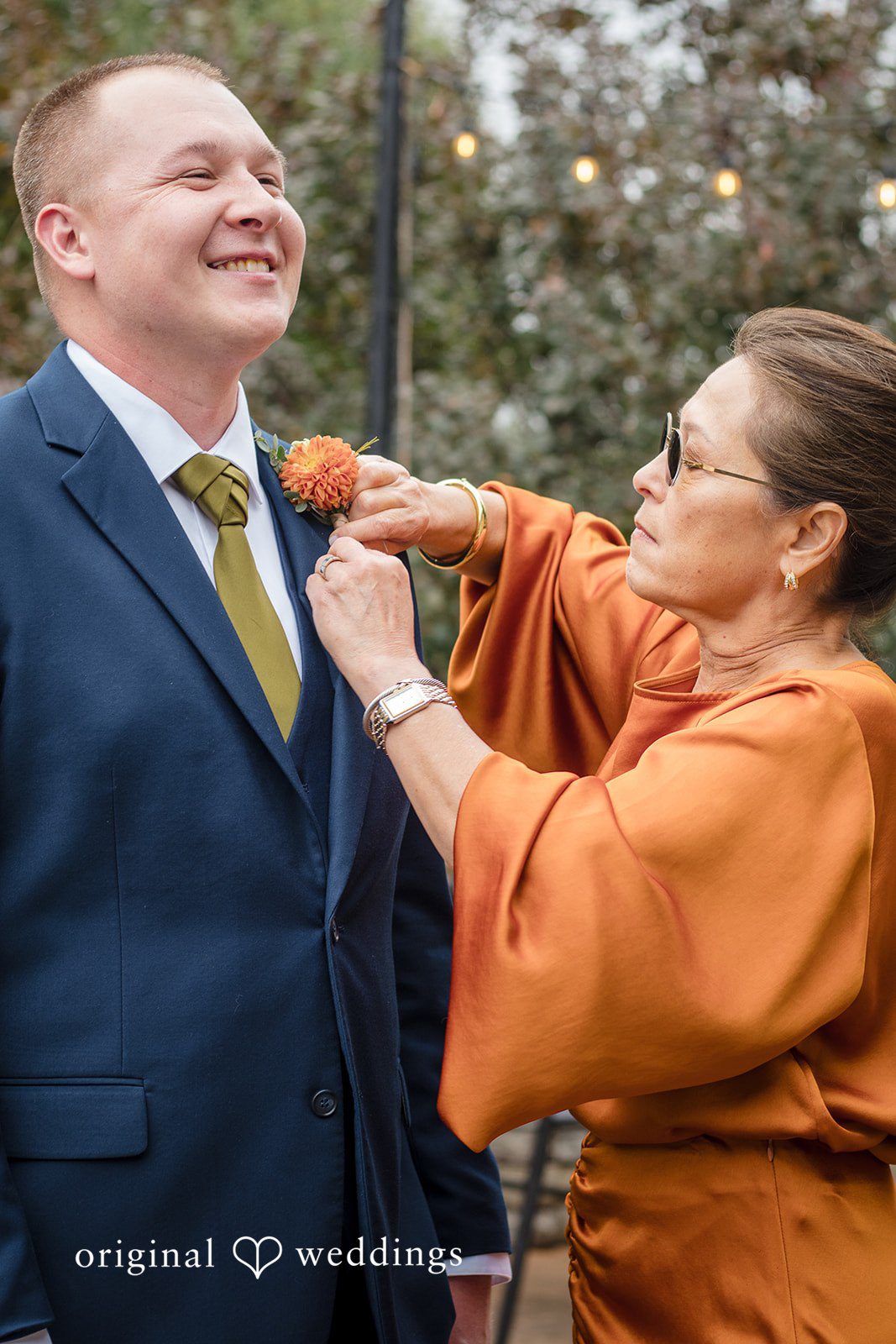 Evelyn + Blues Elegant groom suit preparation moment at The Manor - OK