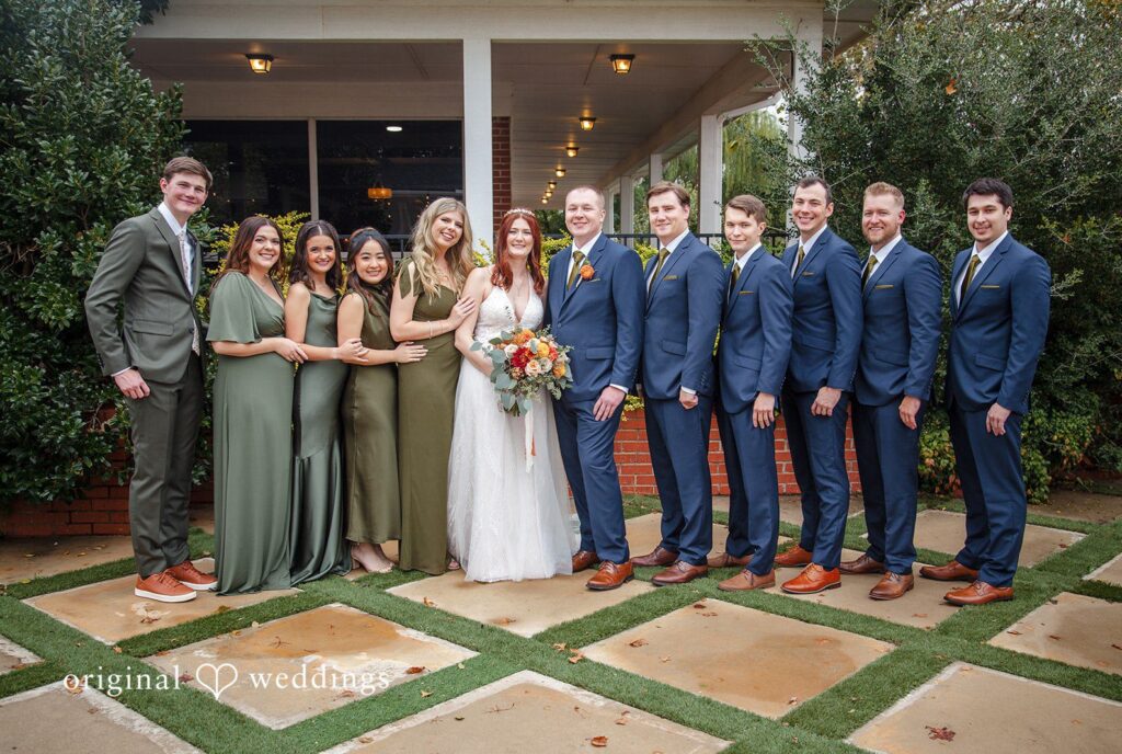 Evelyn + Blues Oklahoma City Wedding Photographers from Original Weddings capturing wedding group photo at The Manor