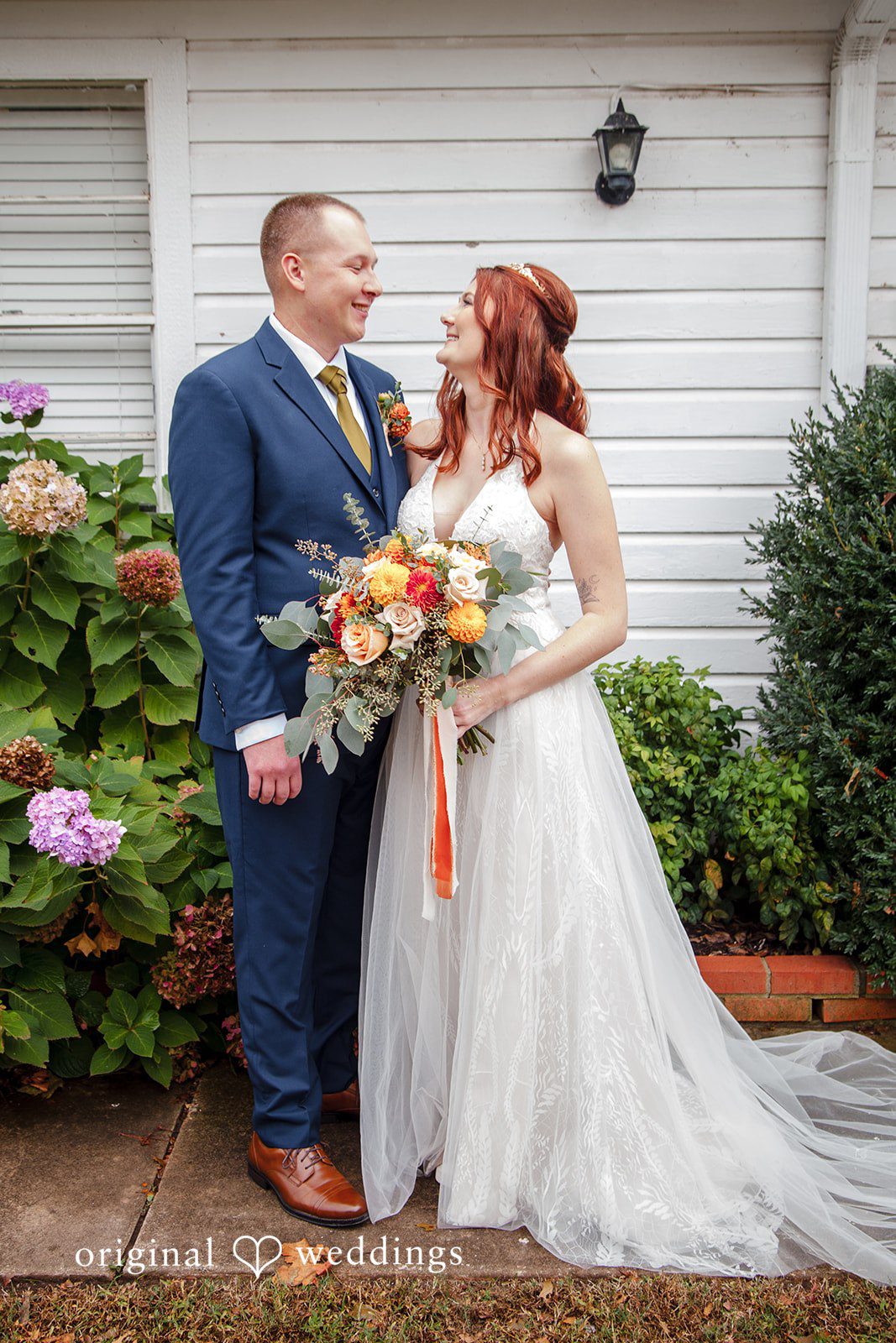 Evelyn + Blues Oklahoma City Wedding Photographers capturing couple looking at each other at The Manor - OK by Original Weddings