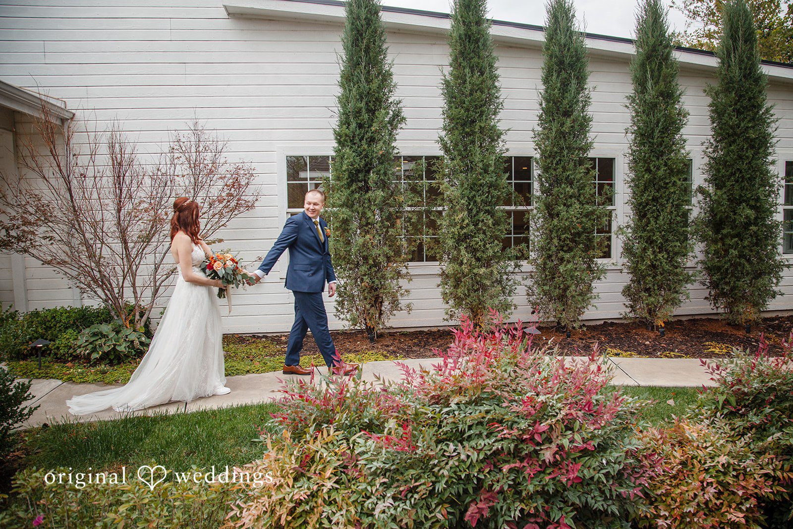 Evelyn + Blues Oklahoma City Wedding Photographers capturing couple walking forward at The Manor - OK by Original Weddings