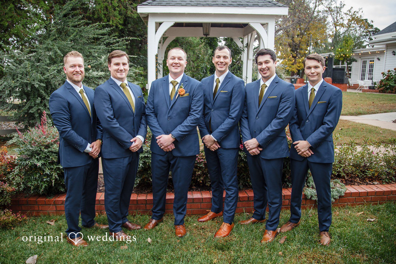 Evelyn + Blues Stylish groom and groomsmen group shot at The Manor - OK