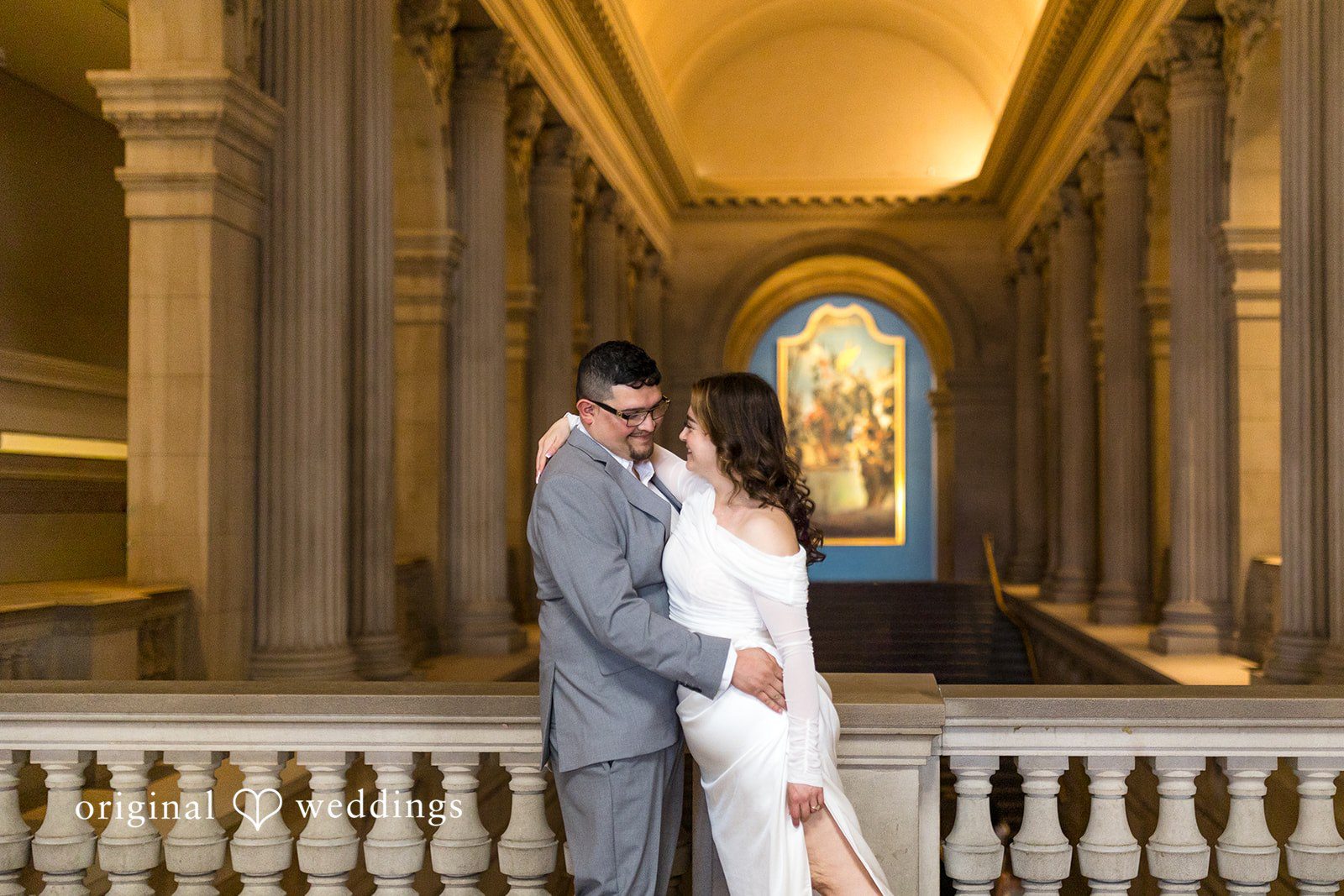 The couple strikes a romantic pose
