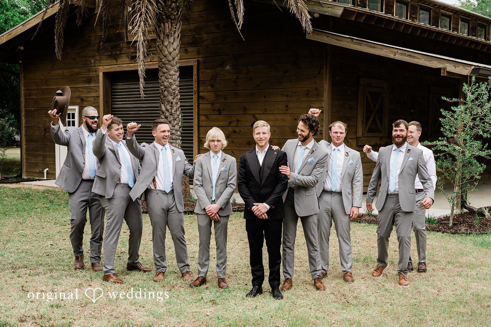 Madeline + John Groom and groomsmen posing together before the wedding