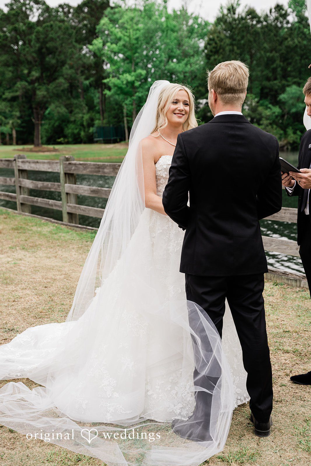 Madeline + John Bride smiling during an emotional ceremony moment