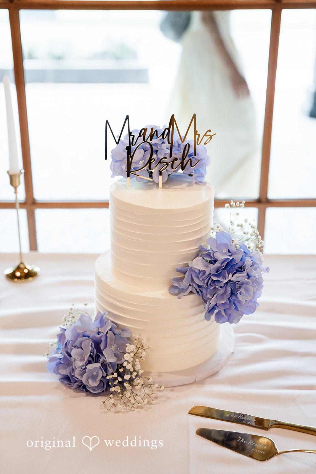 Madeline + John Elegant wedding cake displayed at the reception venue