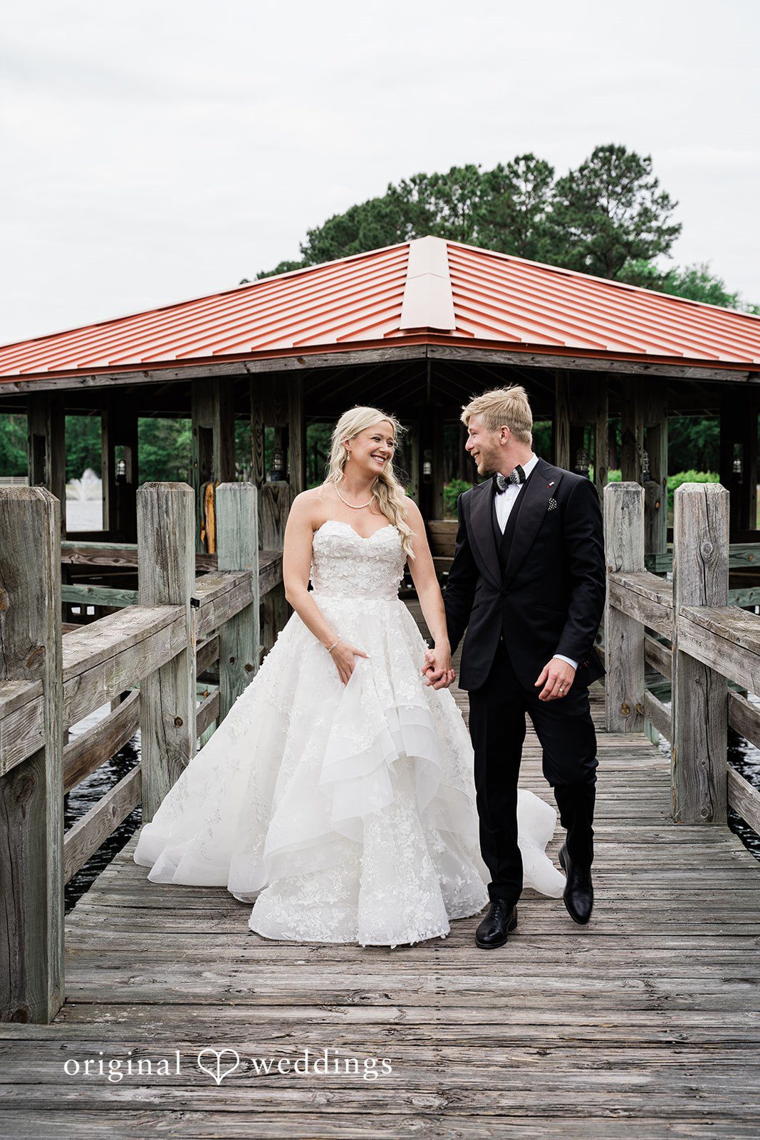 Madeline + John Bride and groom walking together after the ceremony
