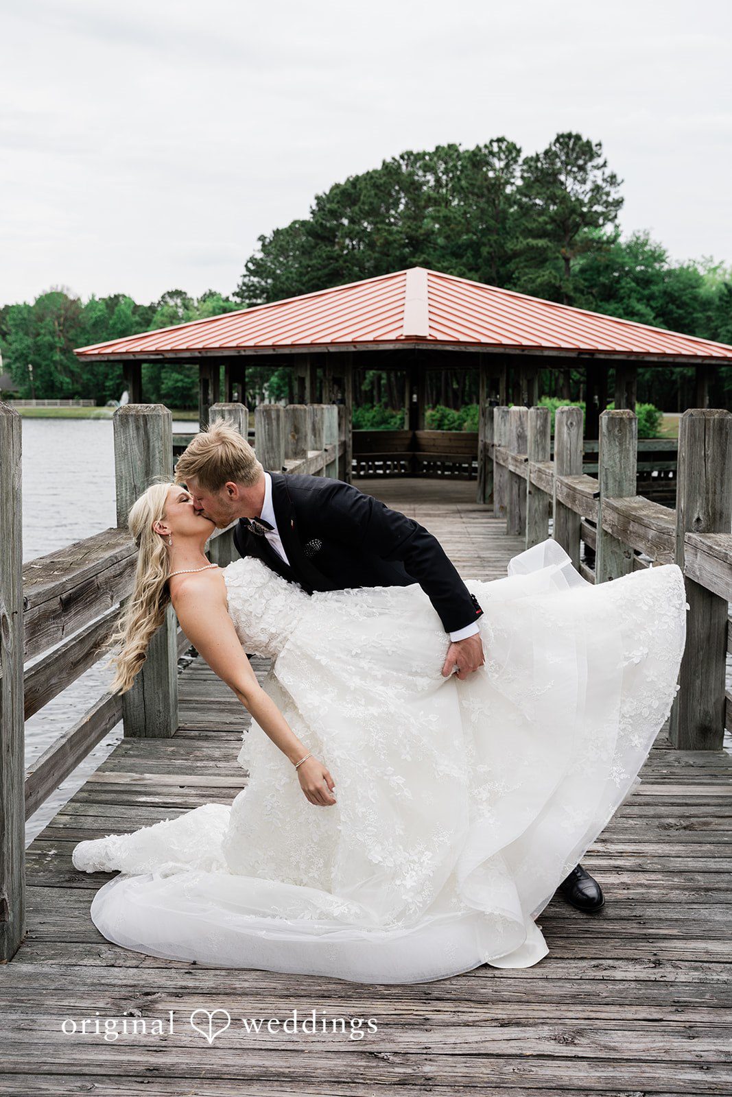 Madeline + John Romantic lakeside moment shared by the newlyweds