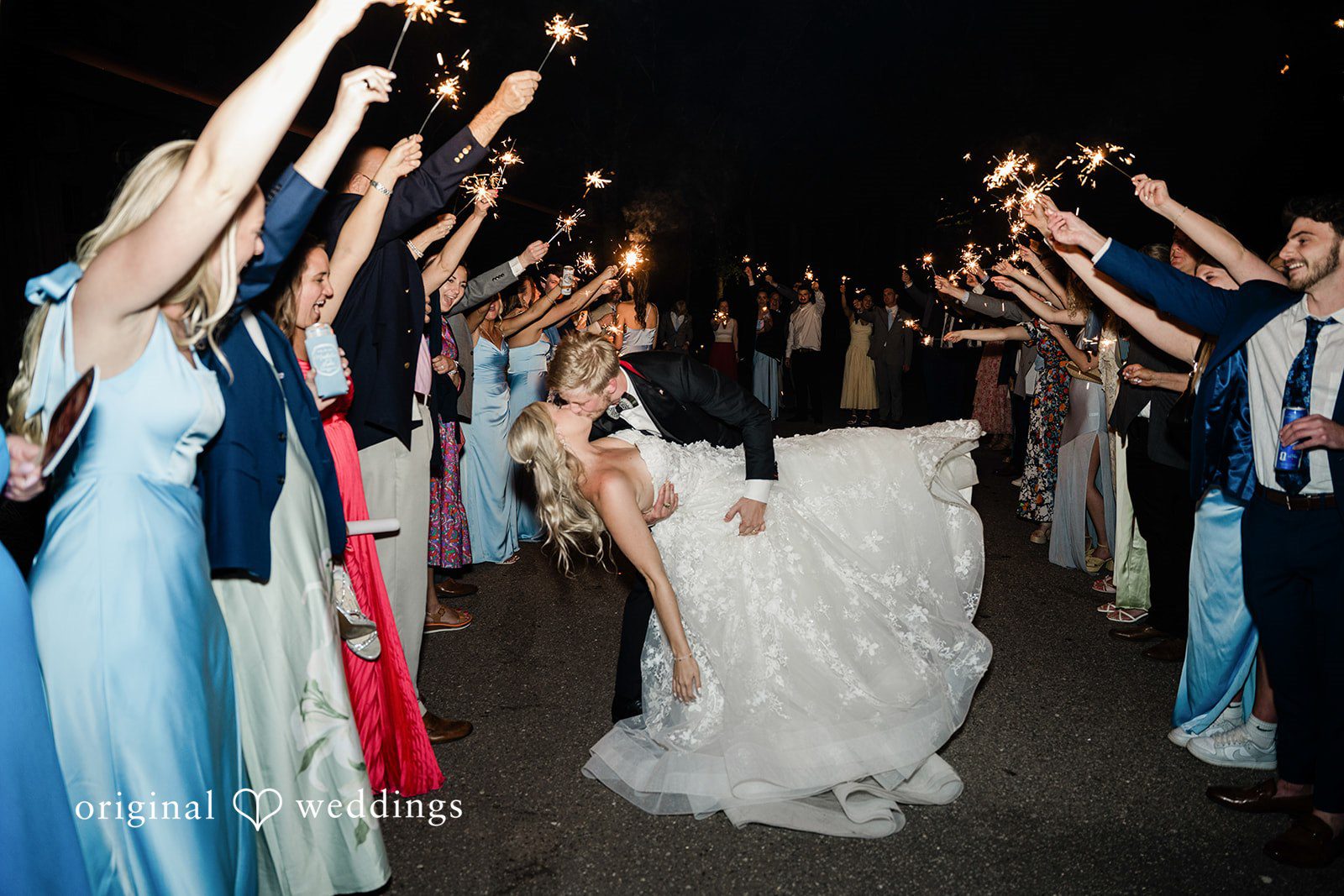 Madeline + John Couple celebrating with guests on the dance floor