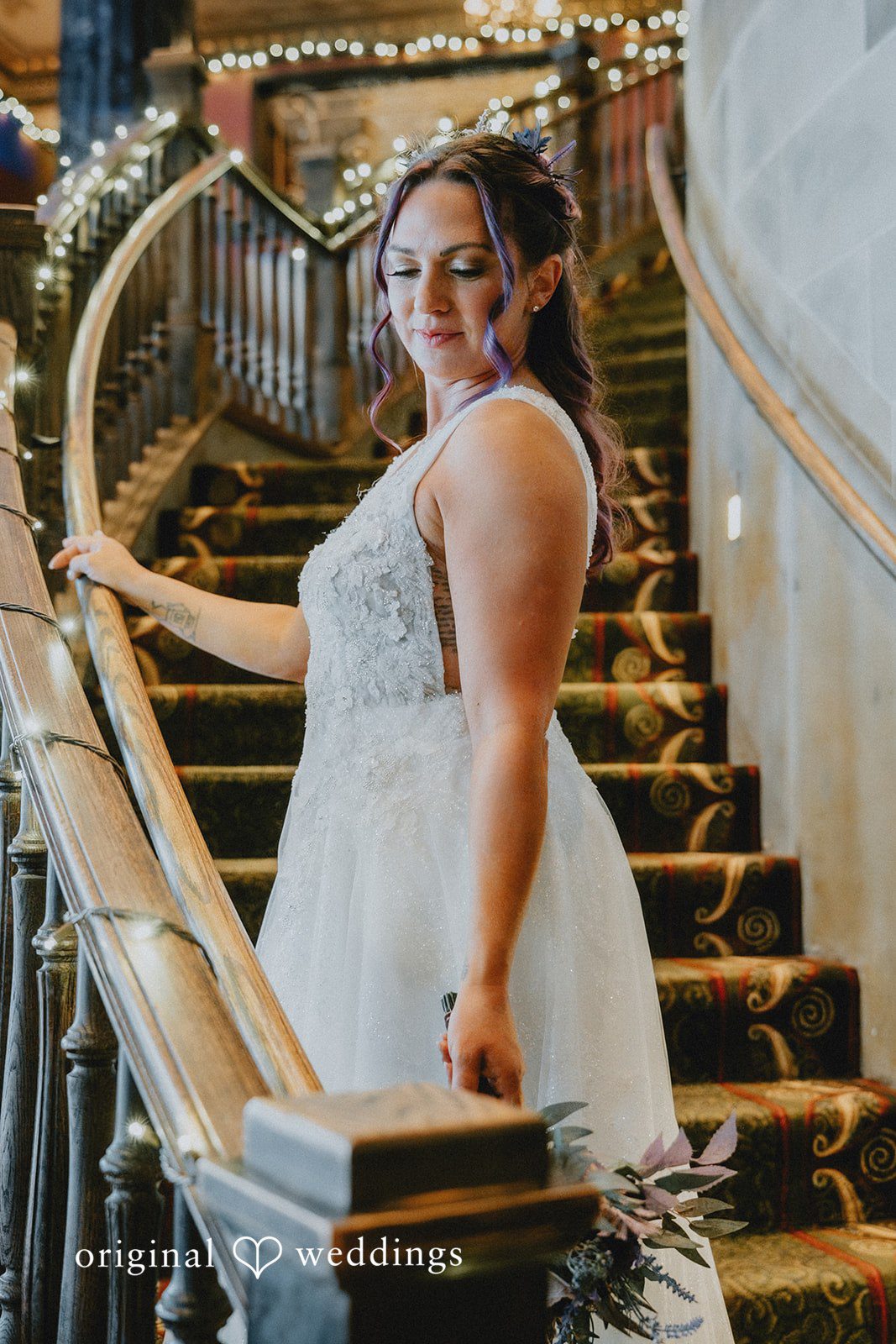 A stunning portrait of the bride by the stairs