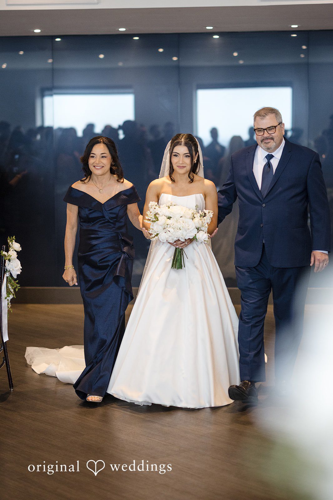 Nathan + Ainsley The bride's parents escort the bride down the aisle