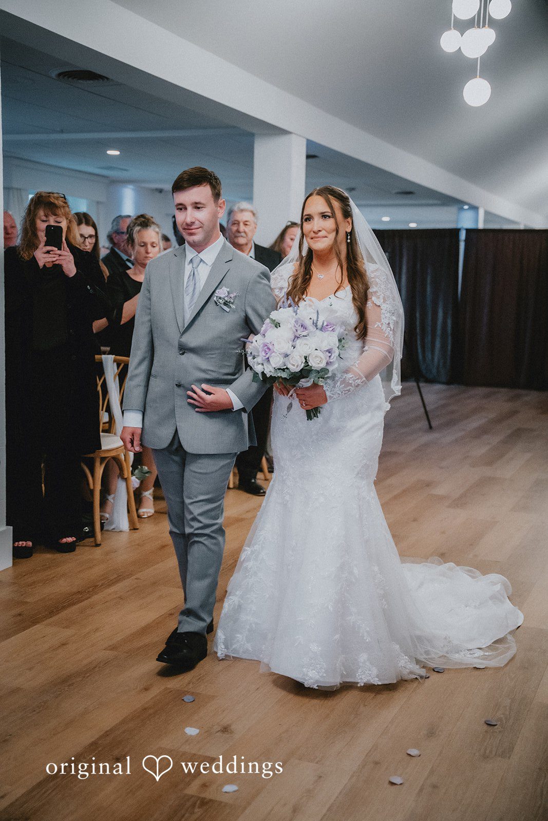 Danielle + Tyler Groom waiting for his bride at the ceremony altar