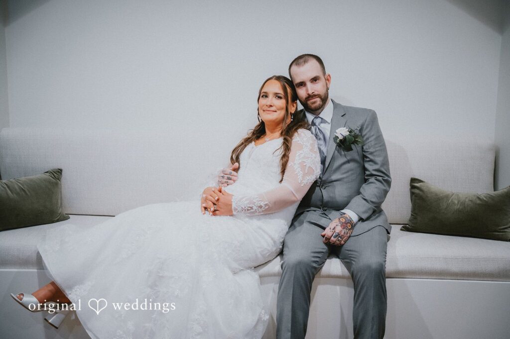Danielle + Tyler Romantic portrait with the groom in focus and the bride smiling beside him