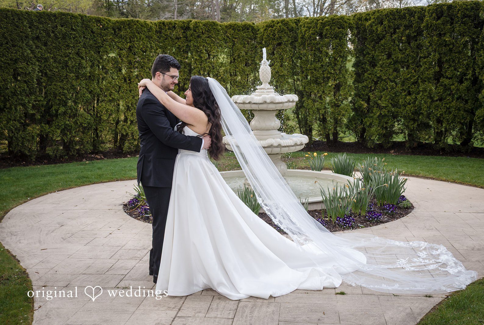 Newlywed couple sharing intimate moment at The Waterview captured by Hartford CT wedding photographers from Original Weddings