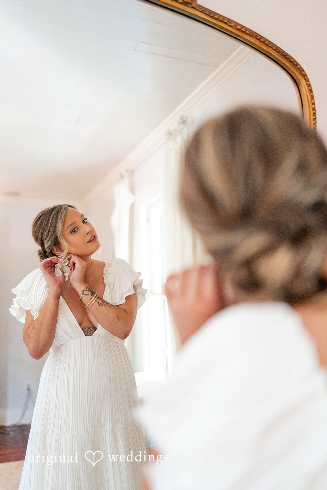 Elizabeth + Zodi Bride getting ready on her wedding morning